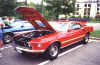 69-mach1-red-gold-1000.jpg (260915 bytes)